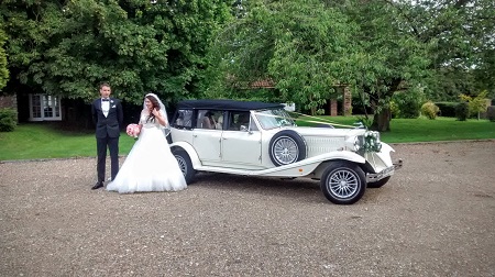 Bride and Groom with their Wedding car at Tickton Grange, East Yorkshire